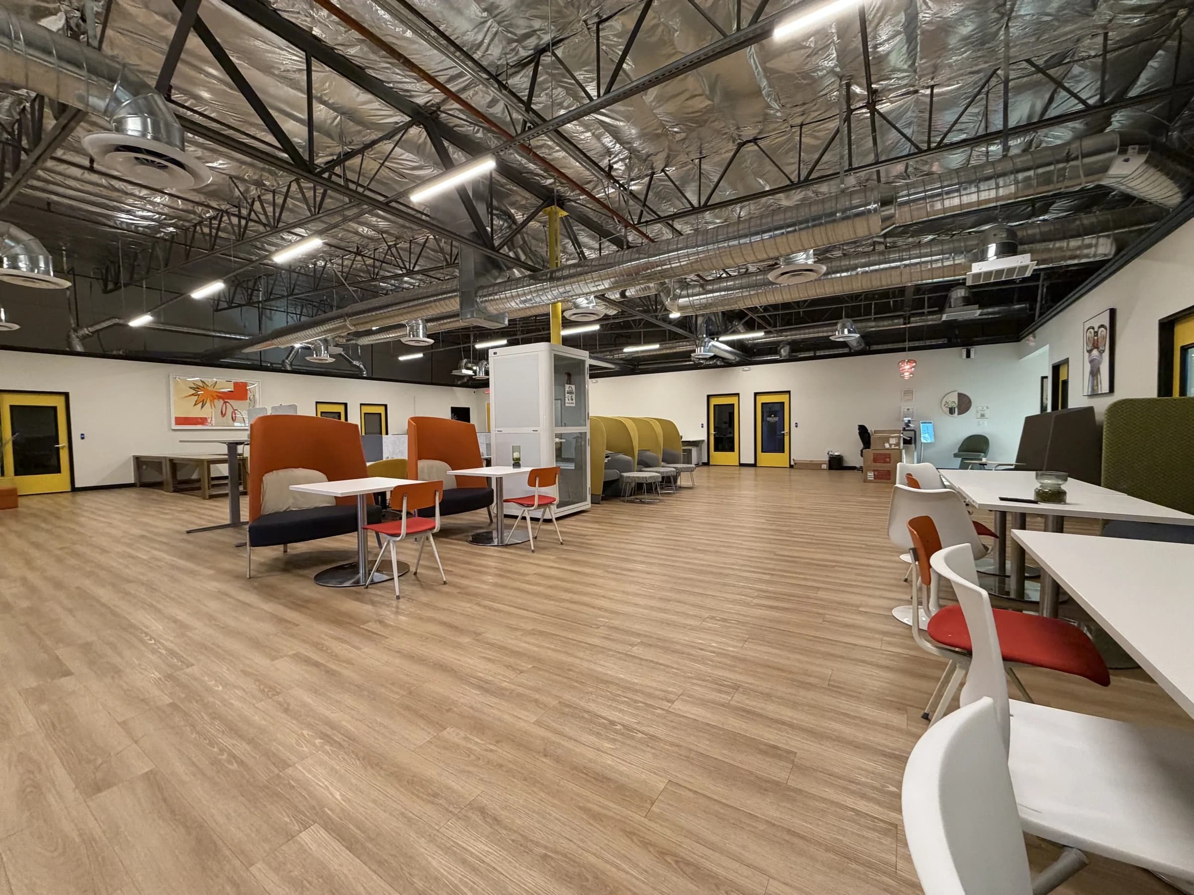 Shared hot desks and lounge seating at Muze Office Las Vegas